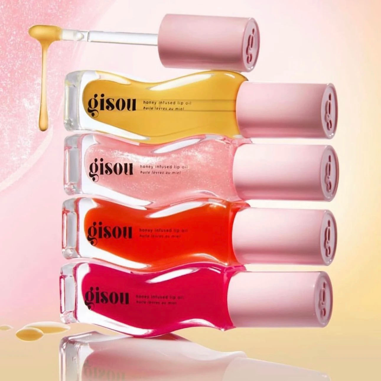 Gisou Honey Infused Hydrating Lip Oil offers nourishing lip moisturizer shine, smooth clear shimmer lipstick care for women.